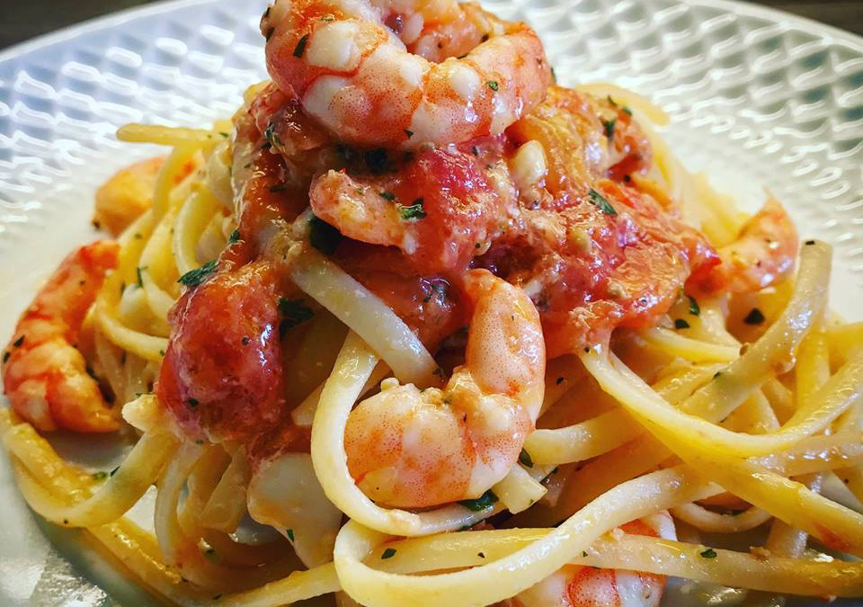 Linguine with cherry tomatoes and king prawns